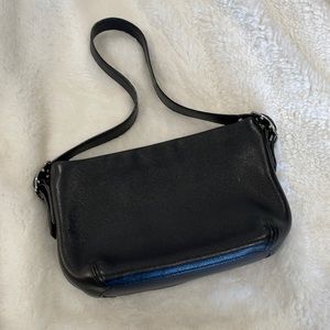 Cute black Coach mini purse for a night out..  fits phone lipstick id,etc.